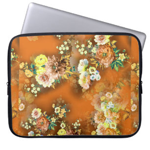 Nahtlose Mix-Blume auf orangefarbenem Hintergrund Laptopschutzhülle