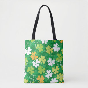 Nahtlose Muster verstreuter Klee und Kleeblatt Tasche