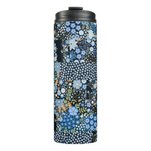Nahtlose Patchwork-Muster aus verschiedenen Stoffe Thermosbecher