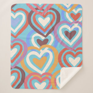 Nahtlose Textur mit lustigen Herzen  Sherpadecke