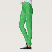 Nahtloser grüner Hintergrund mit Punktenmuster Leggings (Links)