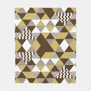 Nahtloses Dreieck: geometrische Goldmode. Fleecedecke