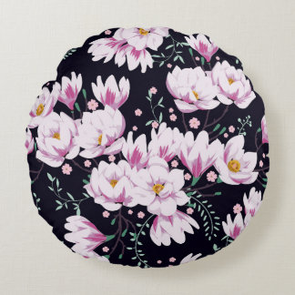 Nahtloses Federmuster mit Magnolien. Rundes Kissen