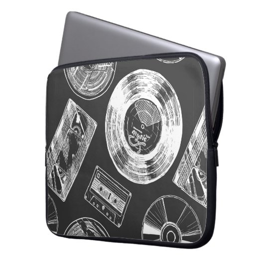 Nahtloses Muster mit Audio- und Videoträgern. Vi Laptopschutzhülle (Vorderseite Links)