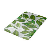 Nahtloses Muster mit Blätter aus grünem Tee Badematte (Schrägansicht)