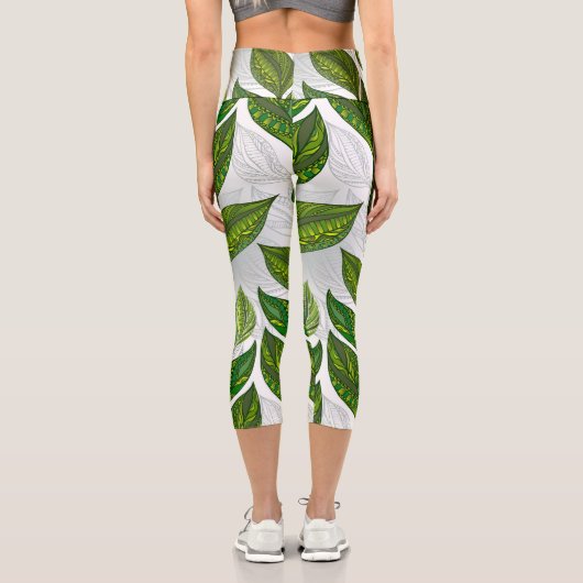 Nahtloses Muster mit Blätter aus grünem Tee Capri Leggings (Rückseite)