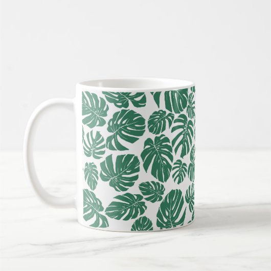 Nahtloses Muster mit Blätter von Monstera. Decorat Kaffeetasse (Links)