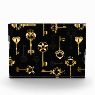 Nahtloses Muster mit Golden Keys Fotoblock