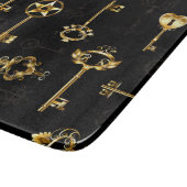 Nahtloses Muster mit Golden Keys Schneidebrett (Ecke)