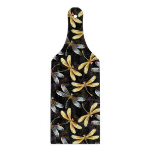 Nahtloses Muster mit goldenen Libellen Schneidebrett