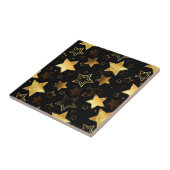 Nahtloses Muster mit goldenen Sternen Fliese (Seite)