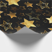 Nahtloses Muster mit goldenen Sternen Geschenkpapier (Ecke)