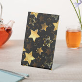 Nahtloses Muster mit goldenen Sternen Sockelschild (In SItu)