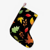 Nahtloses Muster mit herbstgefallenen Blättern und Kleiner Weihnachtsstrumpf (Vorderansicht (hängend))