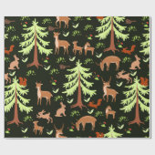 Nahtloses Muster mit Hirschen im Wald. Geschenkpapier (Flach)