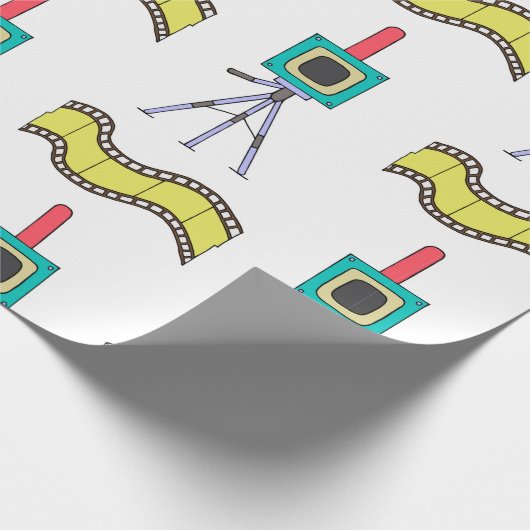 Nahtloses Muster mit Kameras und Filmstreifen Geschenkpapier (Ecke)