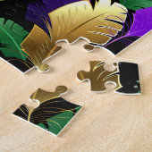 Nahtloses Muster mit Mardi Gras-Federn Puzzle (Seite)