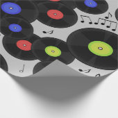 Nahtloses Muster mit Vinyl-Platten und Noten. Geschenkpapier (Ecke)