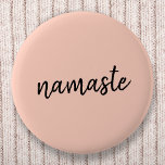 Namaste Peachy Pink Modern Yoga Meditation Button<br><div class="desc">Einfach, stylish "namaste" Art Design in modern minimalist handwritten script typography on pastel peachy pink background. The slogan can easily be personalized with your own words for a perfect gift for a yoga bunny or pilates lover! Namasté literally means "greetings to you". In the Vedas, namaste mostly occurs as grüßte...</div>