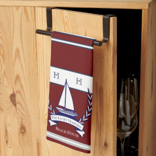 Name der Monogram für das blaue Segelboot der rote Geschirrtuch