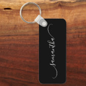 Name der schwarz-weiß gekleideten Swash-Schrift Schlüsselanhänger (Vorderseite)