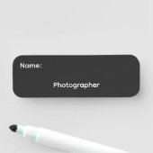 Name des Fotografen auf Pinback Namensschild (Beispiel)