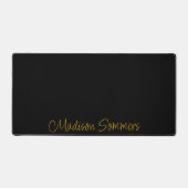 Name des Goldenen Skripts auf der schwarzen Schrei Schreibtischunterlage (Vorderseite)