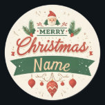 Name Merry Christmas anpassen Runder Aufkleber<br><div class="desc">Feiern Sie die Urlaubssaison mit unserem fröhlichen, Personalisierten Round Sticker. Dieser festliche Aufkleber zeigt eine wunderschön gestaltete Illustration mit dem Text "Frohe Weihnachten" in einem stilvollen, feinen Schriftart. Der Name-Bereich ist anpassbar, sodass Sie jeden gewünschten Namen hinzufügen können. Um den Text herum sind charmante Weihnachtselemente wie Schneeflocken, Schmuckstücke und Heilige,...</div>