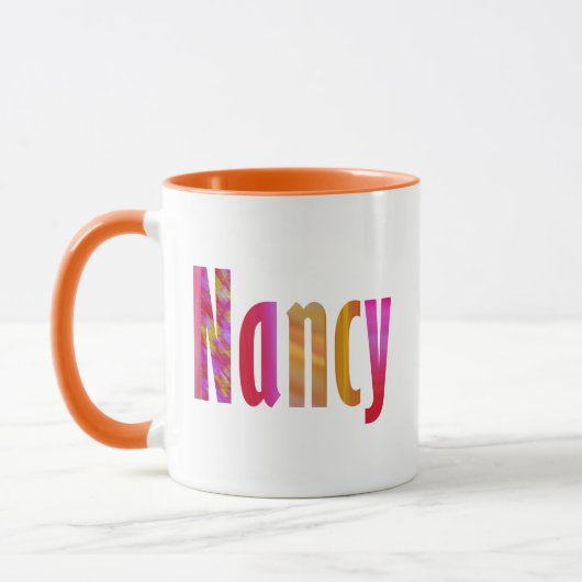 Name "Nancy", lebhafte farbenfrohe rosa orangefarb Tasse (Links)