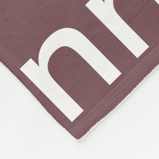 Name Printed in White all-over a Fired-Brick Fleecedecke (Ecke)