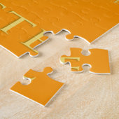 Namensdefinition mit Om-Symbol - auf Orange Puzzle (Seite)