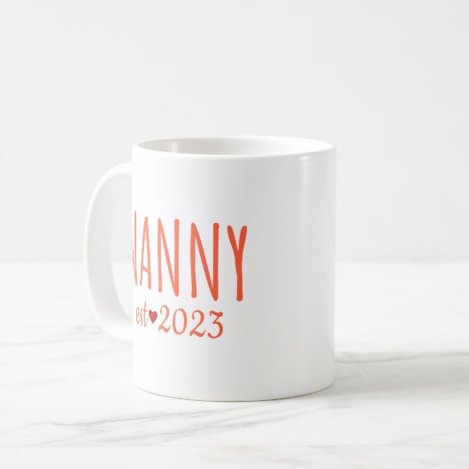 Nanny est 2023 11oz Kaffeepause Tasse (Vorderseite Links)