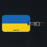 Nationalflagge Patriotic Gepäckanhänger<br><div class="desc">Die Ukraine National Flag Patriotic Gepäckmarke mit der ukrainischen Flagge auf der einen Seite des Tags gedruckt. Der mit dem lebendigen Schriftart geschriebene Ländername ist in das Design am unteren Rand integriert. Der Text kann mit der Funktion "Anpassen!" vollständig angepasst werden. Die andere Seite des Tags ist für Ihre Informationen...</div>