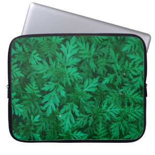 Natürlicher grüner Hintergrund aus grünen Blättern Laptopschutzhülle