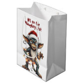Naughty List Gremlin Mittlere Geschenktüte (Vorderseite Schrägansicht)