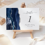Navy Blue Silver Agate Wedding<br><div class="desc">Der links Rand dieser eleganten modernen Hochzeitskarte weist eine marineblau-Aquarellgrenze auf,  die mit Imitaten aus silberfarbenem Glitzer bestickt ist. Der individuell anpassbare Text kombiniert handgeschriebene Holzkohle und kursiv und kopperplate Schriftart auf weißem Hintergrund.</div>