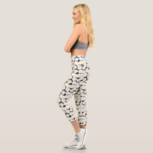 Negative Space Daisies weiß gelb auf schwarz Capri Leggings