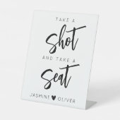 Nehmen Sie einen Schuss und nehmen Sie das Plakats Sockelschild (Vorderseite)