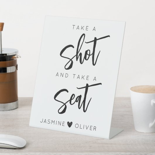 Nehmen Sie einen Schuss und nehmen Sie das Plakats Sockelschild (In SItu)