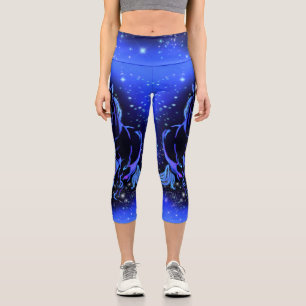 Neon Blue Horning bei Mondlicht Starry Night Capri Leggings