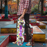 Neon Graffiti mit Lila Motto "Live to Ride" Skateboard<br><div class="desc">Das Skateboarddeck platziert sich in lebhaften Farben, mit Neonspritzen aus Rosa, Gelb, Blau und Grün vor einem weißen Hintergrund. Im Mittelpunkt steht das kühn lila "Live to Ride"-Motto, das die freimütige und dynamische Atmosphäre der Skate-Kultur perfekt einfängt. Das graffiti-inspiriert Design mit dynamischen Strichen und abstrakten Mustern verleiht dem Brett ein...</div>