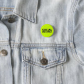 Neon-grünes schwarzes Button in sozialer Entfernun (Beispiel)