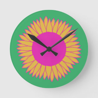 Neon Pink und Orange auf grüner Sonnenblume Runde Wanduhr