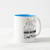 Neugierige Katze, leicht von Oud-Spielern abgelenk Zweifarbige Tasse (VorderseiteRechts)