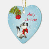 Neugierige Weihnachtsküche mit einem roten Bow Keramikornament (Links)