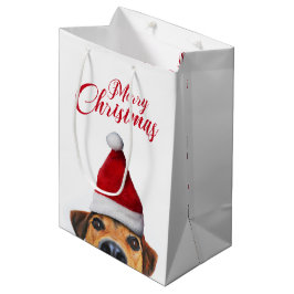 Neugieriger Niedlicher Hund mit Weihnachtsmannmütz Mittlere Geschenktüte