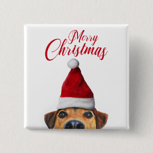 Neugieriger süßer lustiger Hund mit Weihnachtsmann Button
