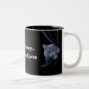 Neugieriges blauäugiges Kätzchen Zweifarbige Tasse