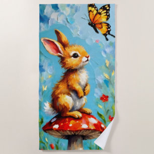 Neugieriges Kaninchen und Schmetterling Strandtuch