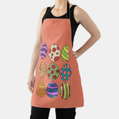 Neun farbenfrohe Ostereier auf All-Over Print-Schü Schürze (InSitu)